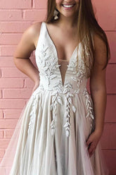 A-Line Appliqued V-neck Satin and Tulle Ivory Bridal Gown Wedding Dress